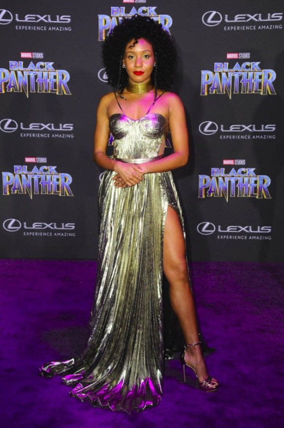 Nabiyah Be wearing silver gown